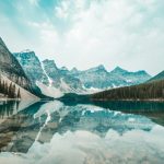 US Canada Comparison - landscape photography of snowy mountains