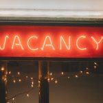 Property Vacancy - a neon sign that says vacancy on it