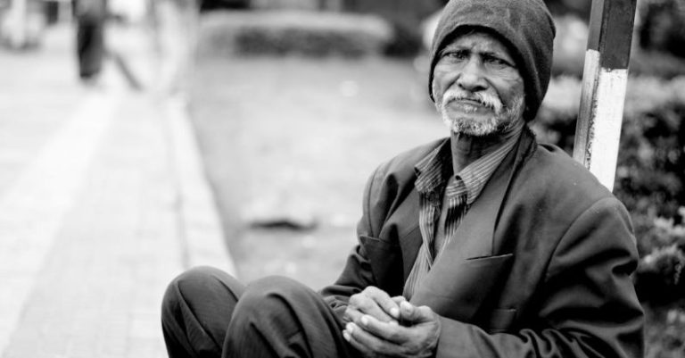 Economy Crisis - Grayscale Photography of Man Sitting