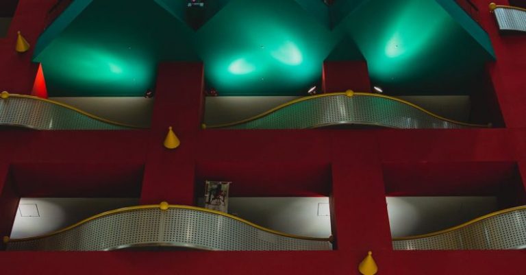 Asia Investment - Illuminated lights on modern architectural tower