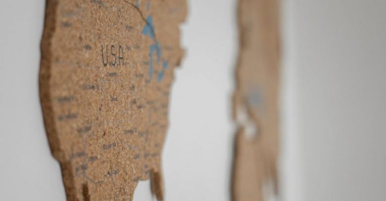 US Canada Comparison - World map on white wall