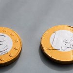 Property Value - Coins one euros lying on gray table