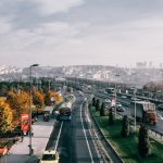 Multiple Offers - Multiple lane highway with driving vehicles located in Istanbul city suburb area on autumn day