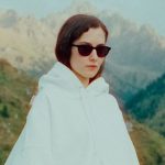 Short Long Term - Teenage Girl Wearing Short Skirt and Blouse in Mountains