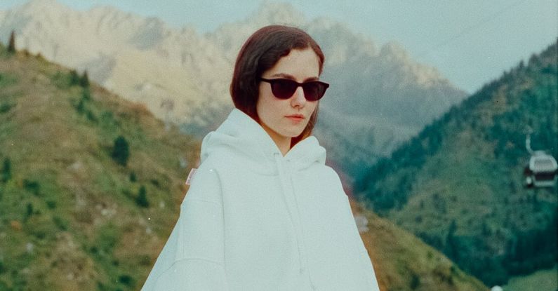 Short Long Term - Teenage Girl Wearing Short Skirt and Blouse in Mountains