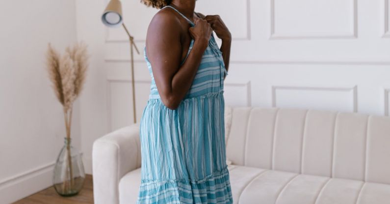 Tenant Retention - Smiling Woman in Dress in Bright Living Room