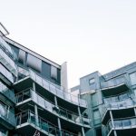 Commercial Residential - Modern geometric glass building with balconies