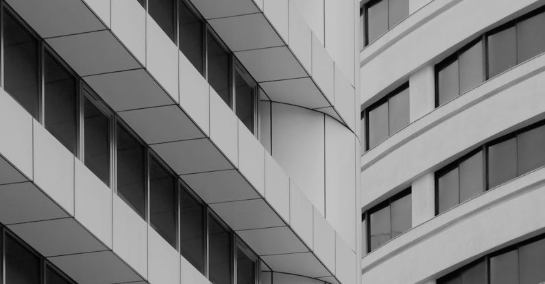 Commercial Complex - White Concrete Buildings with Glass Windows