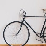 Economic Cycle - Black Fixed-gear Bike Beside Wall