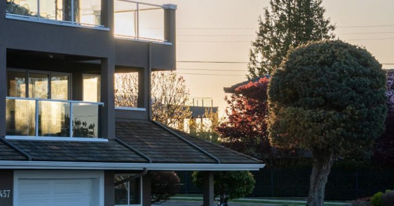 Wealth Building - A house with a balcony and a balcony with a balcony