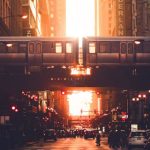 High-rise Construction - Urban city district with modern high rise architecture and elevated railway in early evening