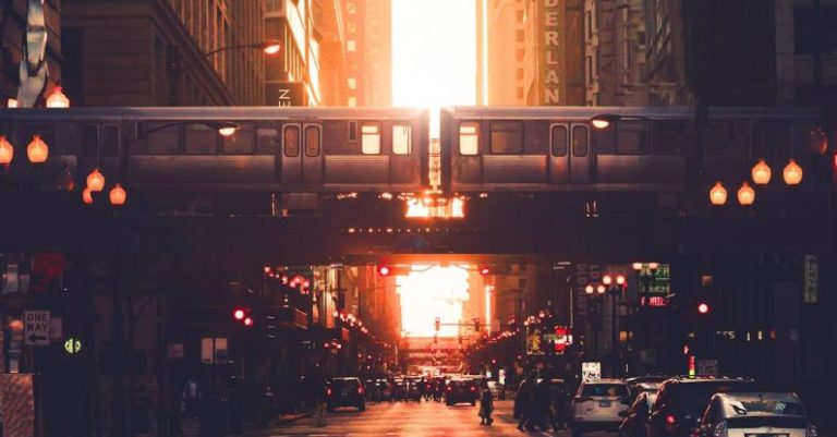 High-rise Construction - Urban city district with modern high rise architecture and elevated railway in early evening